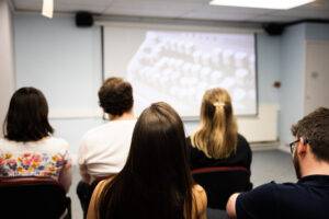 People at Edinburgh Deaf Festival watching a short film